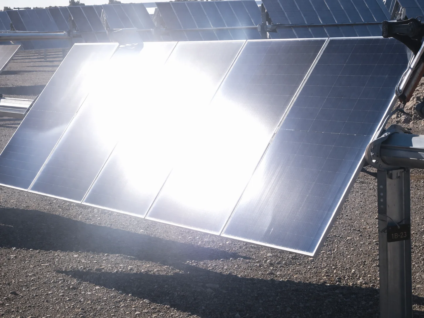 Close-up of strong glare across a solar panel surface that can reduce usable tie-point texture.